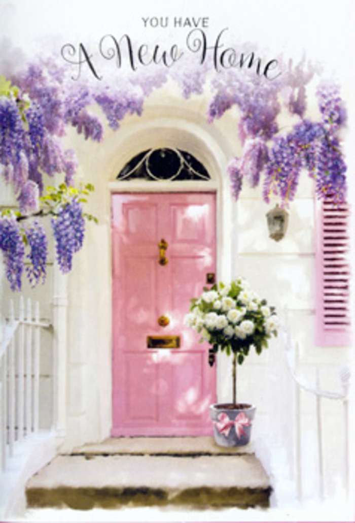 A serene, storybook entrance in Waterloo opens onto a world of gentle colour and floral grace, as though hidden just beyond the busy rhythm of the station and the South Bank. The eye is first drawn to a beautifully painted front door in a soft, blush pink, its panels highlighted by a wash of natural light that gives the wood a velvety, almost powdered look. Flanking the door are whitewashed walls and a neatly painted shutter, both subtly textured and catching the sunlight in pale, quiet tones that allow the flowers to take centre stage. From above, cascades of wisteria hang in layered clusters of lavender and dusky lilac, their delicate petals creating a romantic curtain that frames the doorway like a floral arch. Nestled at the threshold is a timeless arrangement of white and cream roses, gathered with the careful hand of a skilled local florist. These roses, full and plush, sit in a simple grey tin-style bucket, the metal slightly worn in a way that adds rustic charm rather than distraction. Between the roses, sprigs of soft green foliage wind gently, introducing a cool freshness that evokes the nearby greenery of Jubilee Gardens or a quiet corner of a Waterloo courtyard. Around the bucket's base, a satin ribbon in pale pink is tied in a relaxed, flowing bow, reflecting the door's colour and bringing a sense of harmony to the composition. The sunlight falls in delicate patches across the step, creating an atmosphere of calm optimism, as if the arrangement has just been delivered to celebrate a move, a new key in the lock, or the beginning of a new chapter that deserves to be welcomed with fragrance, beauty, and warmth.